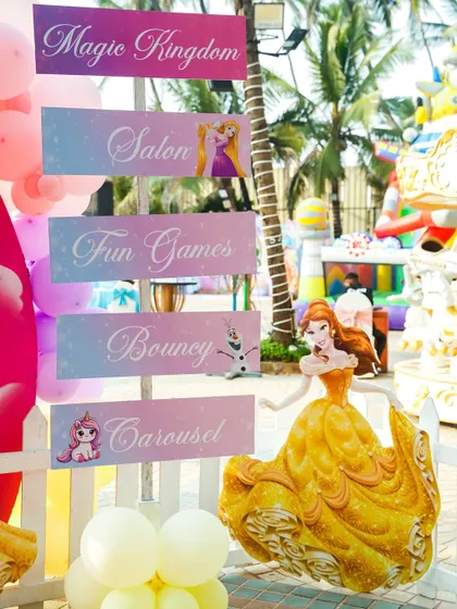A beautiful pastel gradient sign for a princess party, with directions to the 'Magic Kingdom', 'Salon', and 'Carousel'.