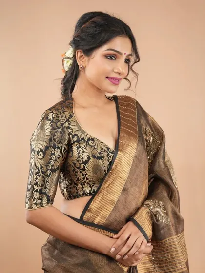 A classic combination of a brown linen saree with a black and gold brocade blouse. This entire look can be achieved in minutes with my pre-stitched sarees and custom blouses.