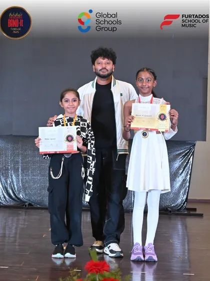 Celebrating the young winners from our Bangalore showdown. These talented performers are holding their well-earned certificates and medals.
