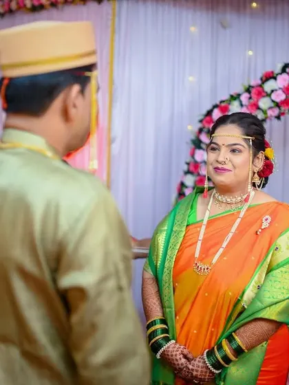The bride's beautiful look of anticipation as she sees her groom during the wedding ceremony.