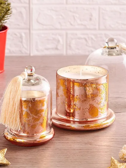 My hand-poured bell jar candles in elegant rose gold and gold. These make for a luxurious corporate gift, wedding favor, or a special treat for yourself.