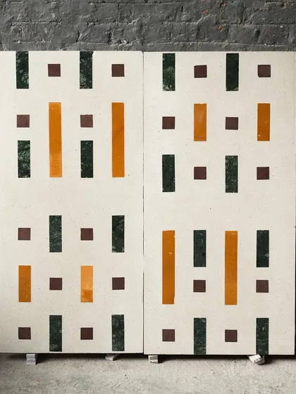 Two large panels of the geometric Venetian terrazzo, ready for installation as a feature wall or countertop.