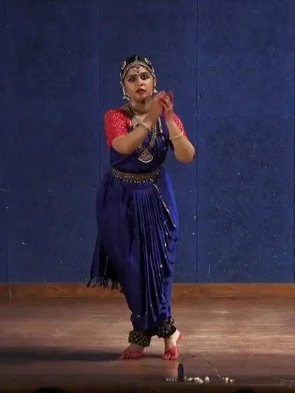 A full-stage view from the same performance, showing the importance of posture and stage presence in a solo recital. Every movement, no matter how small, is choreographed to fill the space and engage the audience.