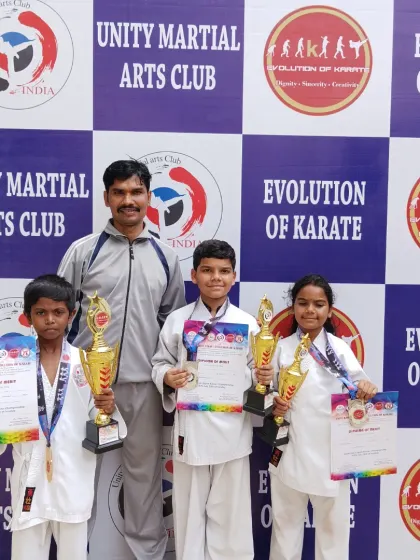 I am happy to share this moment with my students who won multiple prizes at the South Indian Open Karate Championship 2025. Their smiles show the joy of achievement.