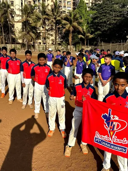 Our U-12 Red Team, lined up and showing their team colors. This is where they learn to play for the badge.