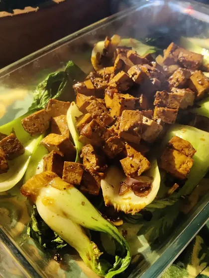 A healthy and flavourful dish of Bok Choy stir-fried with tofu in a savoury black bean sauce, perfect as a main or side dish.