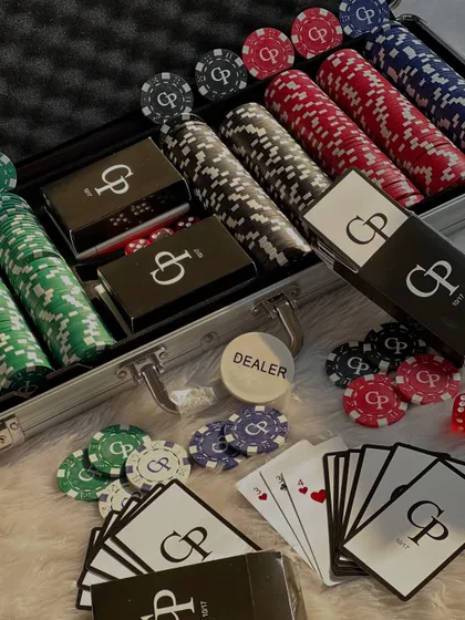 For the couple who loves game night. This custom poker set features personalized chips and playing cards with the couple's initials and a special date, all housed in a sleek metal case.