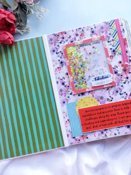 An inside page of the A4 farewell scrapbook, featuring a shaker window and a pocket for messages.