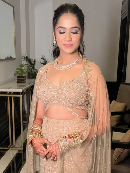A close-up on the eye makeup for Shrriya's reception look. The silver and black smokey eye adds a touch of drama that is perfect for an evening celebration.
