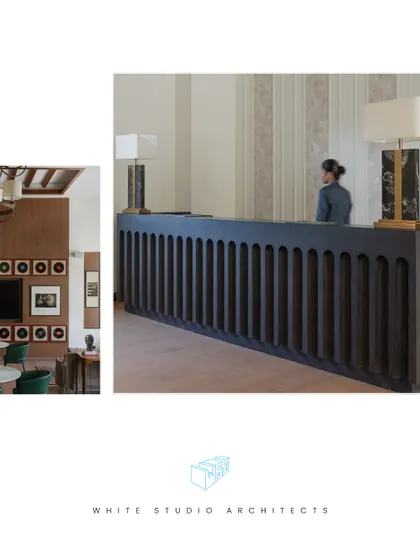 The reception desk at the DLF Club bar lounge features a striking black fluted design, complemented by elegant marble lamps. This sets a sophisticated tone upon entry, hinting at the classic yet modern aesthetic within.