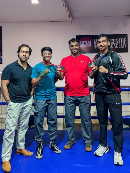 Coaches Darshak Pawase and myself with our national bronze medalists, Siddhesh and Riddhi Pawase. A team effort from start to finish.