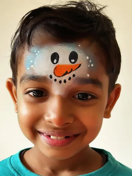 This snowman face paint is just the cutest! It's a fun design that brings one of winter's most beloved characters to life.