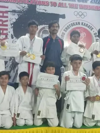 A group of my junior and senior students with their certificates and medals from the Kempegowda Cup.