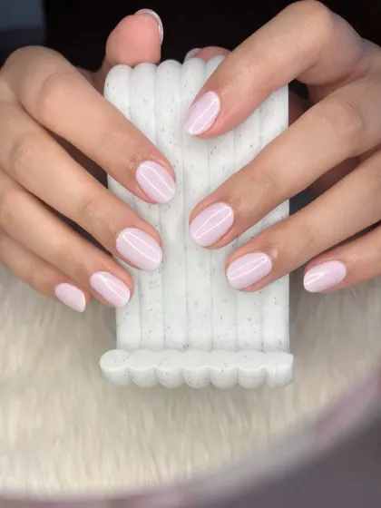 Another view of the chic milky lavender manicure.