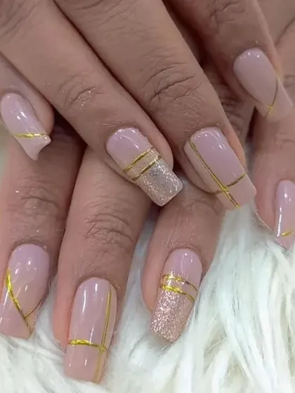 Another view of the elegant nude and gold line work design.