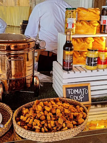Our classic Tomato Soup station, complete with a large copper tureen to keep the soup warm. We serve it with a basket of crunchy croutons and a selection of fresh breads for a comforting start to the meal.