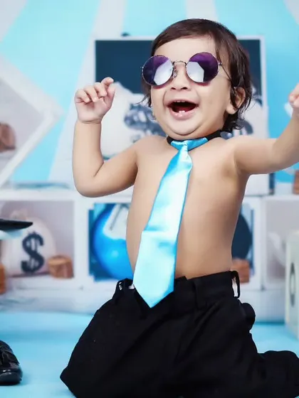 A moment of pure joy from our little boss, laughing and playing during his themed session.