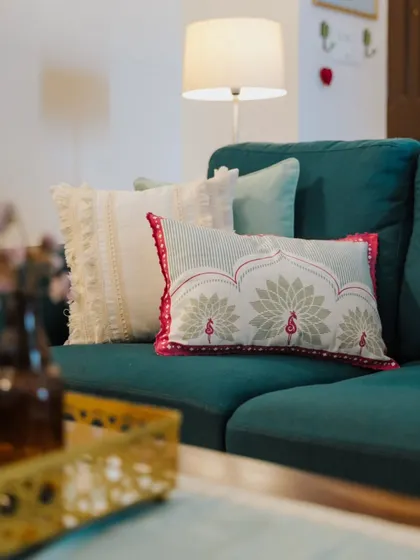Another angle showing the beautiful details of the embroidered and fringed cushion covers from our festive Rani Collection.