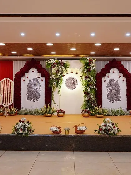 This traditional naming ceremony was designed around the baby's name, Mitakshi, which is another name for Maa Durga. I created a serene and sacred atmosphere using rich red fabrics, intricate peacock illustrations, and beautiful floral arrangements to honor the family's story.