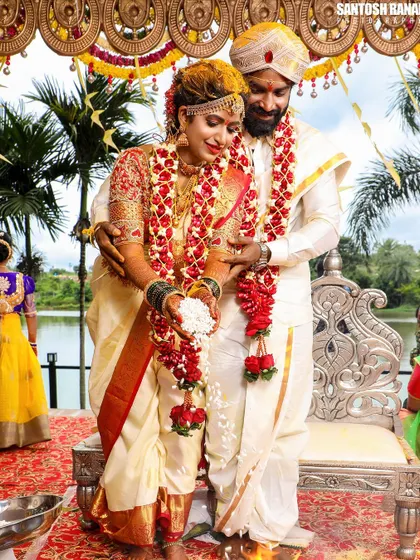 A tender moment between the couple during their South Indian wedding ceremony.