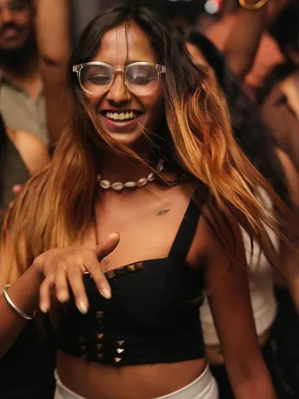 A huge smile from a happy dancer.