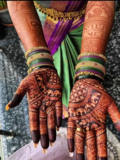 The stain on the next day is always the darkest and most beautiful. This photo shows the deep, almost black color that can be achieved with my special henna blend.