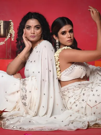 A series of images from a creative and art direction project for Ruhm India. We used a bold red backdrop to contrast with the elegant white chanderi and mirror-work outfits, creating a visually striking and artistic campaign.