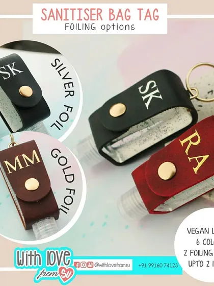 Personalize your sanitizer tag with your initials in either a classic gold foil or a sleek silver foil. This detail shot shows how the metallic lettering stands out against the different leather colors.