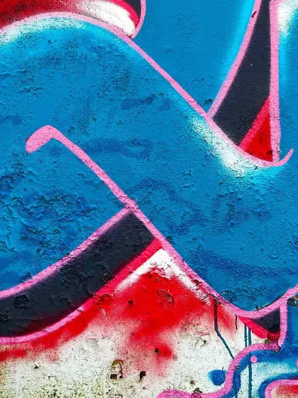 Another texture shot from the Shiva piece, showing the spray paint on the rough wall surface.