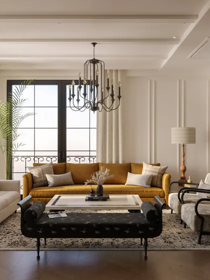 A wide view of the living area, where a mustard yellow sofa and a patterned black bench add pops of color and personality. The large windows and sheer curtains ensure the room remains bright and airy.