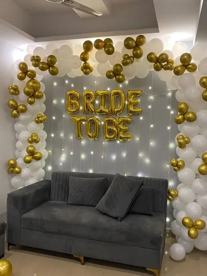Another angle of the elegant 'Bride to Be' decoration, showing the full balloon arch and the comfortable seating area I arranged for the celebration.