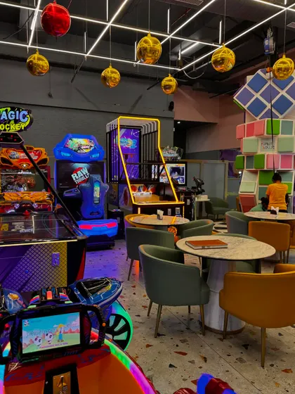 Our cafe and arcade area is the perfect spot for parents to relax while older kids enjoy games like Magic Hockey and racing simulators.