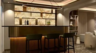 A render of the bespoke bar area within the neoclassic villa. The design features a backlit onyx wall and elegant pendant lighting, showcasing how I plan for both functionality and high-impact aesthetic moments.