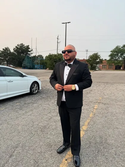 Suited up and ready for a wedding reception in Canada. I adapt my style and music to fit the location and the couple's taste.