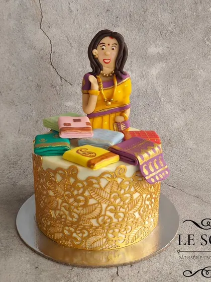 This saree-themed cake is one of my signature designs and never goes out of style. This half-kg Red Velvet cake features a beautiful figurine surrounded by a stash of tiny, hand-painted fondant sarees.