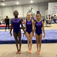 Three of our Level 4 athletes representing our team at the State Championships.