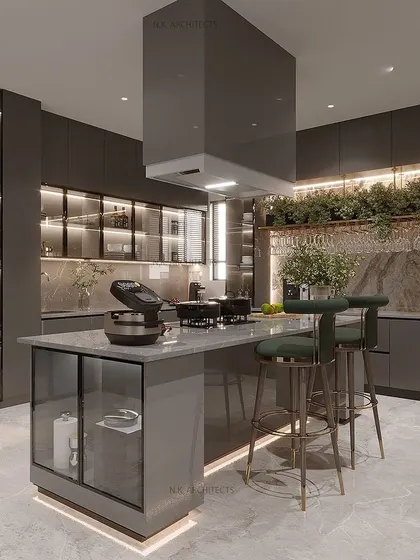Another view of the grey and golden kitchen, showing the bar stools at the island, making it a perfect spot for casual meals or conversations while cooking.