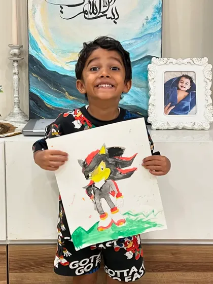The excitement is real! He is so proud of his finished Sonic painting, and so am I!