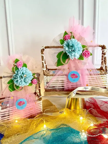 Our festive wicker basket hampers add a traditional touch to your Diwali gifts. Filled with our gourmet treats and wrapped in decorative tulle, they make for a stunning and delicious present.