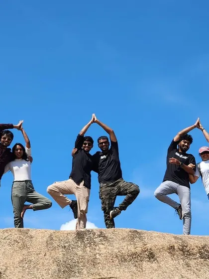 A group of our dedicated students taking their yoga practice to the hills. Their creativity and passion for yoga are truly inspiring.