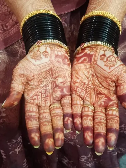 A close-up of the deep reddish-brown stain on the palms. I provide instructions on how to care for your mehendi to get the darkest and longest-lasting color possible.