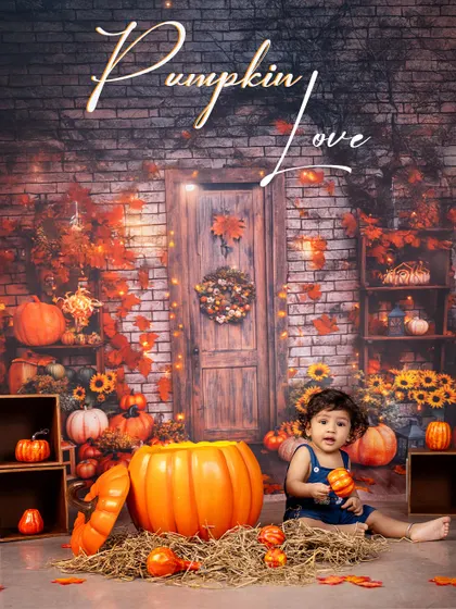 Pumpkin love in the air. This little one is surrounded by the warm colors of autumn, sitting happily in a setup filled with pumpkins and sunflowers.