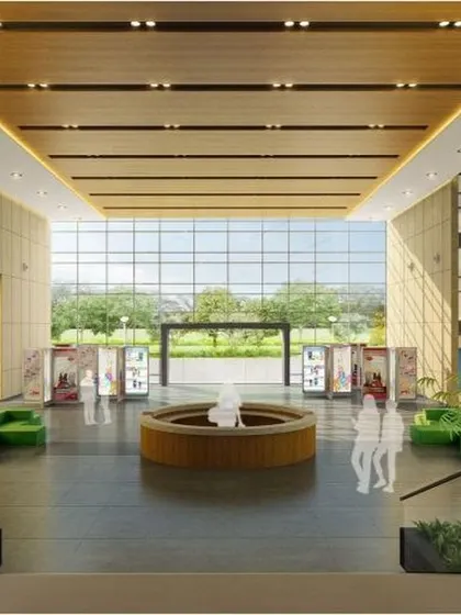 The entrance lobby at Amity University, Mumbai, is designed to be a welcoming and open congregation space. The use of natural materials, indoor plants, and a central seating arrangement creates a calm yet impressive entry point to the campus.