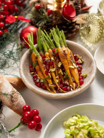 A closer look at our roasted baby carrots with pomegranate and pistachios, a colorful and flavorful addition to the holiday table.