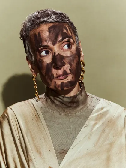 For this Huemn look, we used makeup to create a raw, earthy texture on the skin, complementing the deconstructed garment.