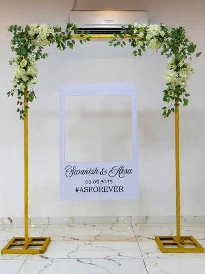 A fun and simple photo booth for guests. The polaroid-style frame with the couple's names and hashtag was a great way for friends and family to capture memories of the day.
