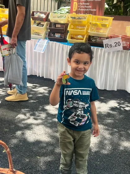 A happy customer with his finished creation. The best part of these events is seeing the kids proudly walk away with something they made themselves.