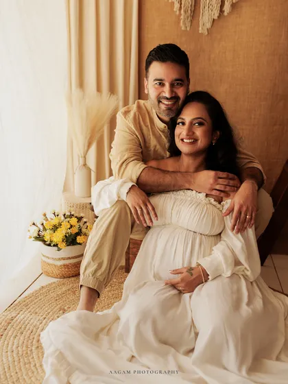 A classic couple's portrait from a boho maternity session. The warm, earthy tones and their happy expressions make this a cherished memory.