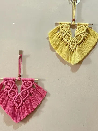 Here is the same mini wall hanging design in a bright pink and sunny yellow. They are sold as a pair and can be customized in any color combination you like.