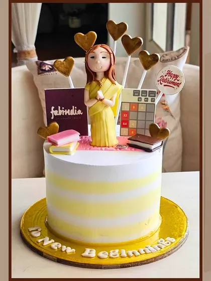 A thoughtful retirement cake with a personalized figure and elements representing a new chapter.